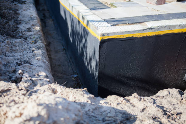 Professional Emergency Waterproofing technician working in Lakeville, IN